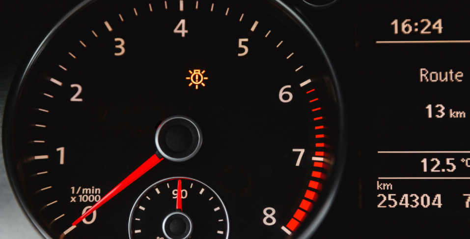 Car dashboard with Lamp Out warning light