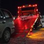 Illuminated oblong 2 LED mini clearance or side marker lights on a tow truck