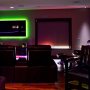 RGB LED light strips can be installed behind displays for accent and controlled by IR or RF controller and remote