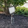 The versatile light withstands outdoor conditions and seamlessly blends into landscapes