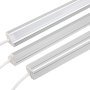 Frosted lens produces smooth, diffused light. Silver aluminum housing is angled for mounting in corners.