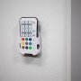 Wall mount cradle offers an easy place to store and access remote control.