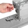 Remove screw covers to adjust brackets.
