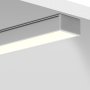 A GIZA-LL aluminum channel fixture surface mounted on a ceiling