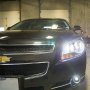 Close Up View of Headlight Housing While Illuminated