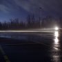 LED Headlight Kit - H13 LED Fanless Headlight Conversion Kit with Adjustable Color Temperature and Compact Heat Sink: Profile View Of LED Headlights Illuminated In Parking Lot