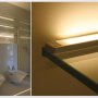 TAMI aluminum channel fixtures surface mounted on glass bathroom shelves