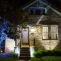 18W Color Changing RGB LED Landscape Spotlight (Remote Sold Separately): Shown Illuminating Magnolia Tree In Blue. 