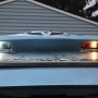67 LED Bulb - 12 LED Forward Firing Cluster - BA15S Retrofit: Installed in License Plate with Comparison to Incandescent Bulb