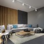 Matte white 20W LED track heads installed in a halo track system lighting highlighting features of a modern living area with architectural wood slat wall and gray sectional sofa