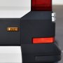 Amber rectangular 3-LED truck clearance or side marker light mounted on a vehicle