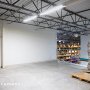 30W LED magnetic strip troffer retrofit kit installed in a warehouse mezzanine