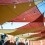 LED Vintage Light Bulb - G16 LED Bulb w/ Gold Tint - Filament LED - Dimmable: Installed in String Lights in Outdoor Patio