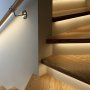 PDS-4-ALU LED aluminum strip channel fixtures installed under stairs and staircase handrail