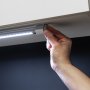 Knobs on each end tighten to secure angle.