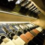 STOS-ALU aluminum surface mount LED strip channel profile fixtures in wine cabinet display