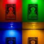 Red, green, blue, and amber beams from track-mounted weatherproof PAR36 screw pin LED flood light bulbs on a framed art print