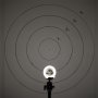 The beam from a natural white weatherproof PAR36 screw pin LED flood light bulb on a target at approximately six feet